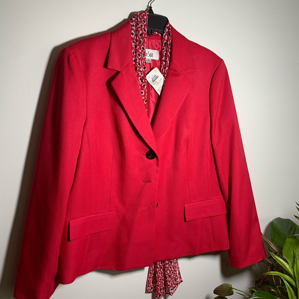 Red suit jacket and scarf